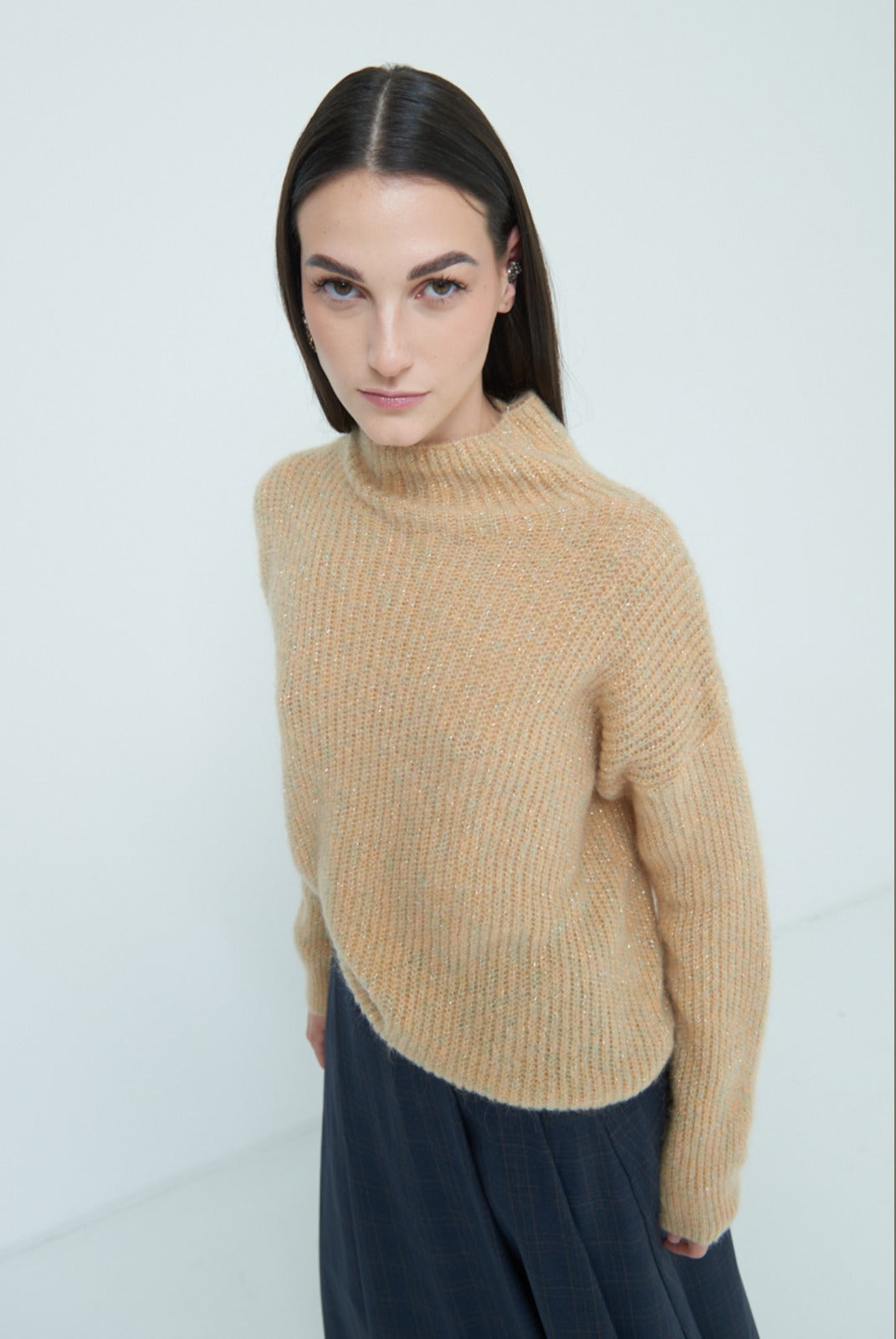 Beige knitwear with glitter